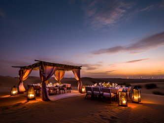 Эскорт в Дубай: Как устроить незабываемый ужин в пустыне на закате